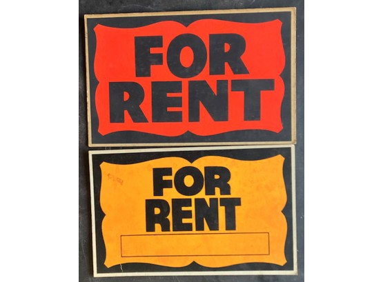 TWO BRIGHT 'FOR RENT' SIGNS