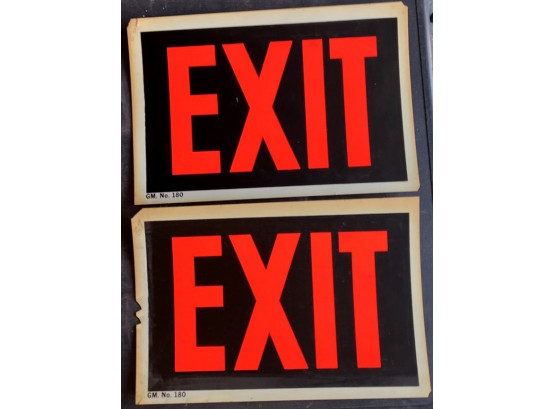 TWO BRIGHT 'EXIT' SIGNS