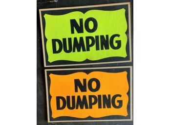 TWO BRIGHT 'NO DUMPING' SIGNS