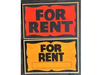 TWO BRIGHT 'FOR RENT' SIGNS