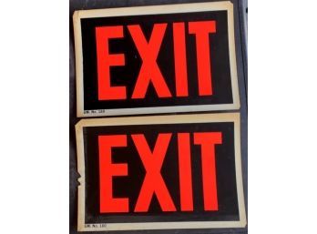 TWO BRIGHT 'EXIT' SIGNS