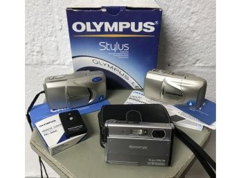 3 Olympus Cameras Plus Remote And Leather Case - Paperwork For Some