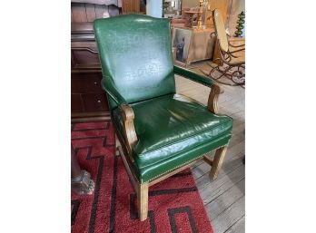 Stately Green Leather Desk Chair With Brass Nail Heads And Carved Wood
