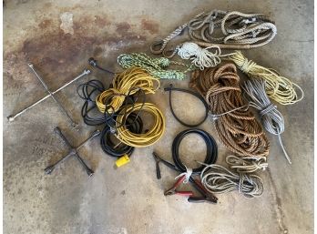 Eight Ropes, Four Extension Cords, A Jumper Cable,  And Two Lug Wrenches