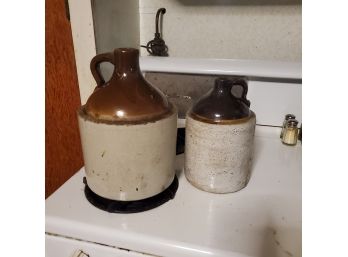 Two Antique Stoneware Brown Two Tone Whiskey Jugs