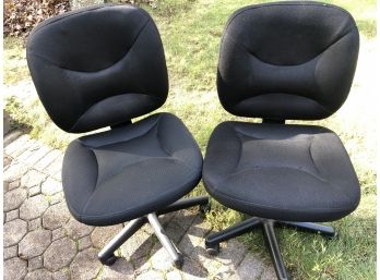 Two Padded Black Office Chairs On Casters