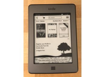 The Kindle Touch (D01200) 4th Generation Kindle E-reader W/WiFi