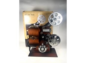 Contemporary Plastic Music Box Film Projector In Original Box