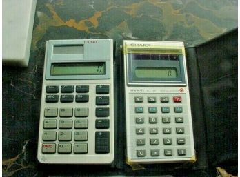 Three Vintage Electronic Calculators, Sharp And Texas Instrument