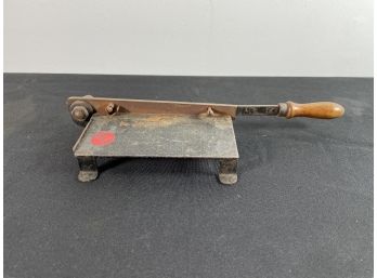 AN EARLY CHILDS PAPER CUTTER