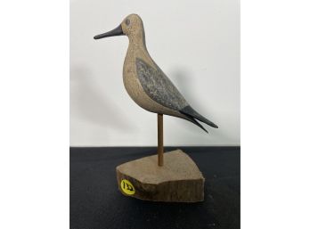 A BRUCE BIEDER CARVED AND PAINTED SHORE BIRD