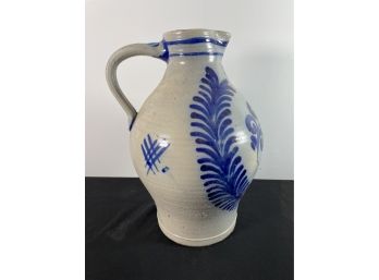 A LARGE TWO GALLON BLUE DECORATED STONEWARE JUG