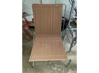 MIDCENTURY STAINLESS STEEL AND CANVAS CHAIR