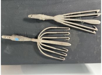 TWO WROUGHT IRON FISHING SPEARHEADS