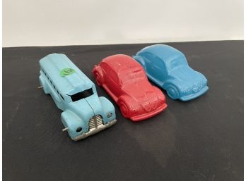 ANTIQUE TOY CAR AND TWO CAR FORM AVON BOTTLES