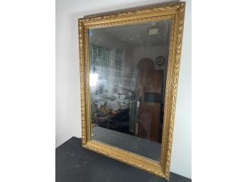 ANTIQUE GILT AND GESSOED MIRROR