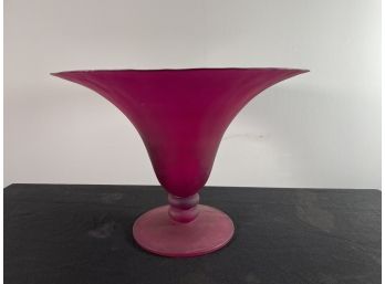 A LARGE RED GLASS CENTER BOWL
