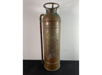 A UNIVERSAL COPPER AND BRASS FIRE EXTINGUISHER