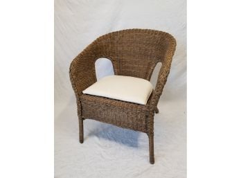Brown Wicker Arm Chair With Seat Cushion
