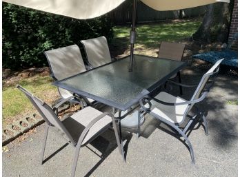 PATIO TABLE AND 3 MATCHING CHAIRS PLUS TWO VERY SIMILAR AND UMBRELLA AND BASE
