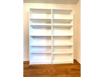 A Pair Of White Bookcases