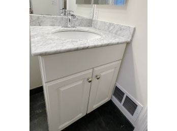 A Marble Top Vanity With Waterfall Hardware- Bath 2