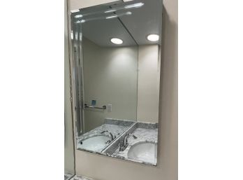 A Mirrored Medicine Cabinet With Beveled Edge - Bath 3