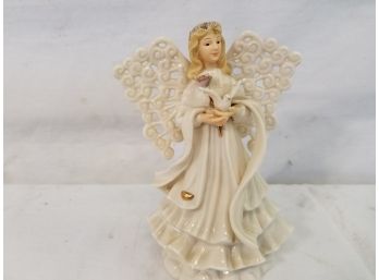 Porcelain Blonde Haired Angel Holding Dove Figurine