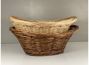A Pair Of Natural Wicker Baskets
