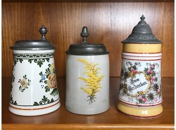Three Collectible Steins With Floral Motifs