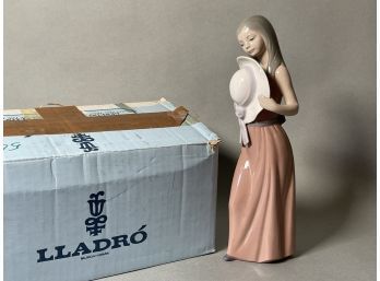 A Lladro Porcelain Figurine, Bashful Girl With Straw Hat, #5007