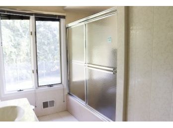 A Double Sliding Shower Door With Metal Frame - Bath 3