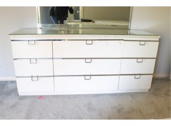 A Wood Dresser With Glass Top - Bedroom 1