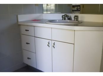 A White Plastic Laminate Vanity With American Standard Drop In Sink - Bath 2
