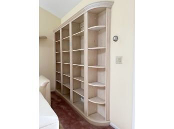A 3 Section Wooden Shelf Affixed To Wall