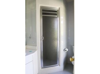 A Rippled Glass Shower Door With Metal Frame - Bath 2