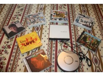 Collection Of Beatles CD's And Sony Walkman