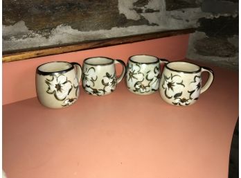 Four Stoneware Mugs
