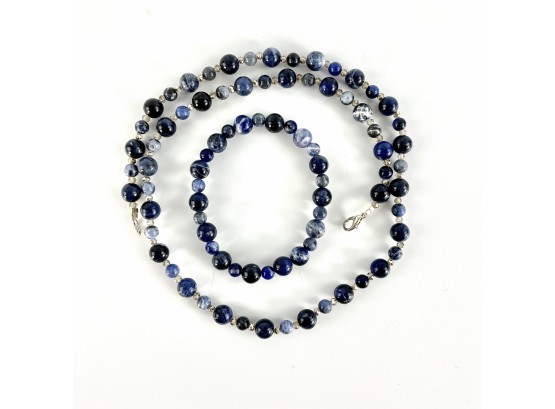 A Lapis Lazuli Bead Necklace With Matching Stretch Bracelet