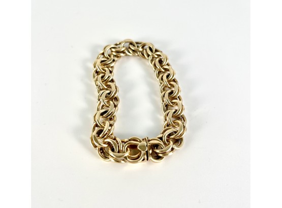 A 14K Link Bracelet With Heart Clasp - 46.8 Grams