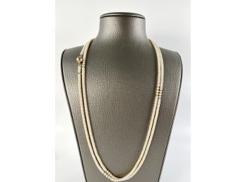 A Lustrous Seed Pearl 60' Necklace With 14k Interspersed Beads And Clasp