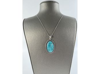 A German Silver Turquoise Pendant - 10.5' Drop