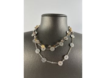A 32' Silver Tone Necklace And A Delicate Floating Necklace