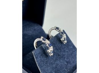 A Lovely Pair Of 18K White Gold Sapphire And Diamond Hinged Post Earrings