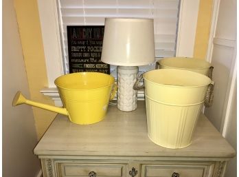 Lamp, Picture, 2 Yellow Trash Cans &  Watering Can