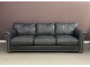 A Stylish, Transitional Three-Seat Leather Sofa By Ethan Allen