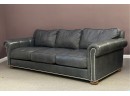 A Stylish, Transitional Three-Seat Leather Sofa By Ethan Allen