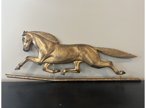 A Replica Antique Weathervane Horse Wall Hanging - Gold Tone Metal