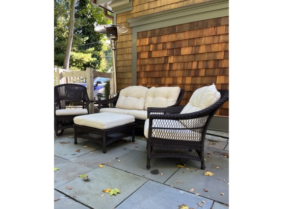 A Four Piece All Weather Wicker Outdoor Furniture Set