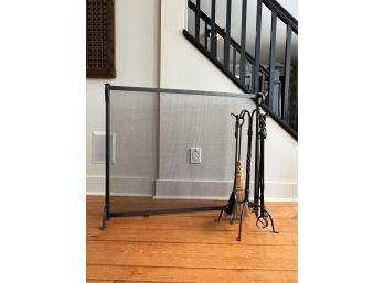 A Wrought Iron Fire Place Screen And Tool Set